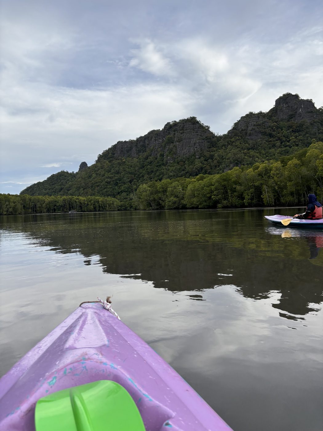 Kayak bow with limestone hill